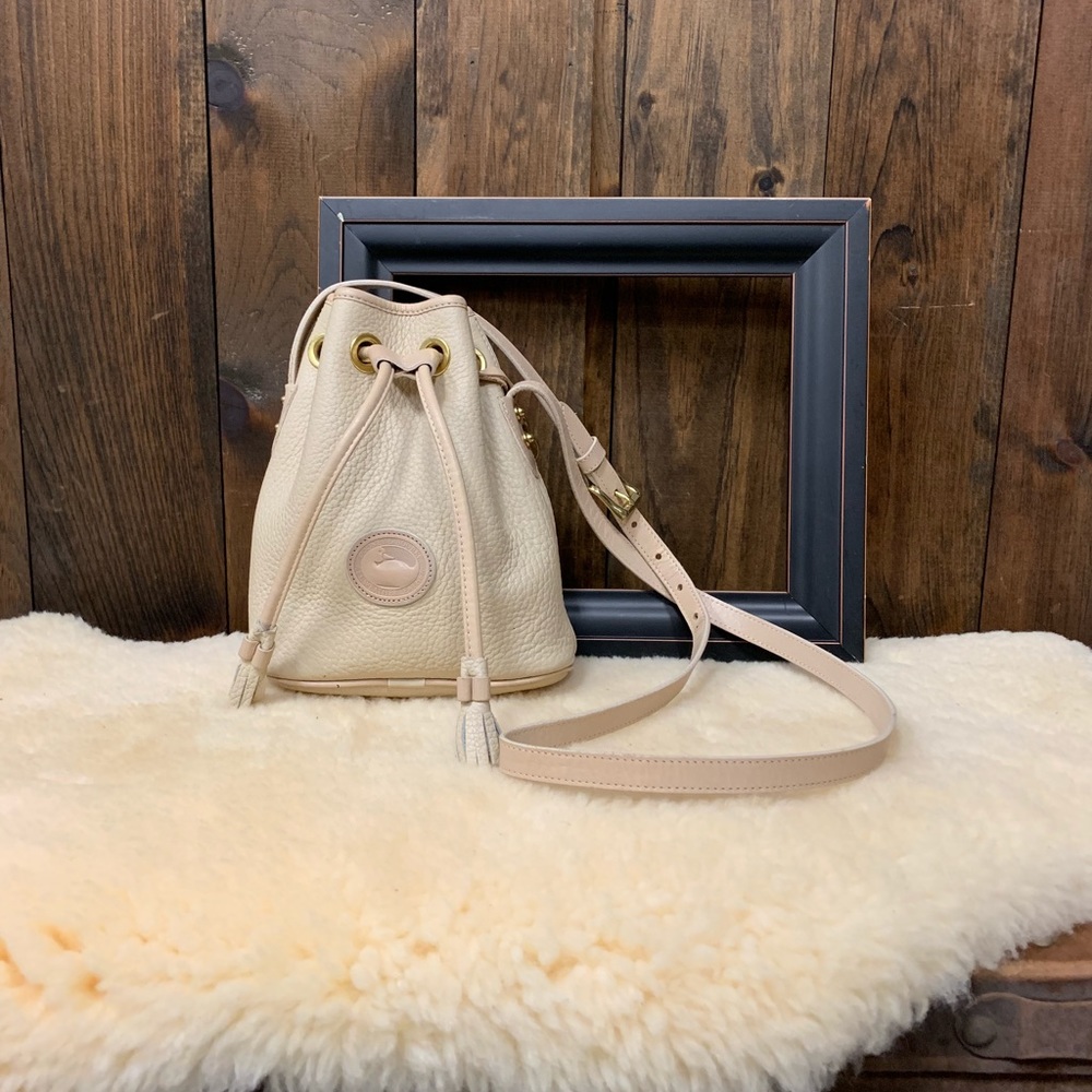 Vintage Dooney & Bourke cream leather bucket bag